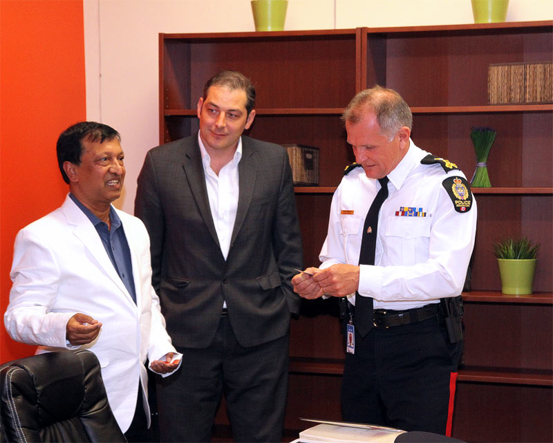 Delwar Jahid with police chief Rod Knecht at the Ethnic Society of Alberta